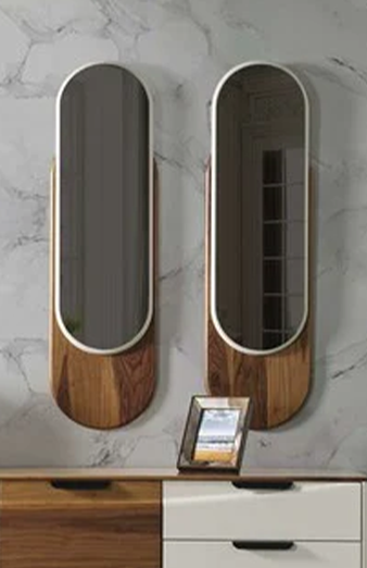 A Lio valódi diófa kerettel ellátott ovális fali tükör, lekerekített szegélyével az otthon modern berendezése.